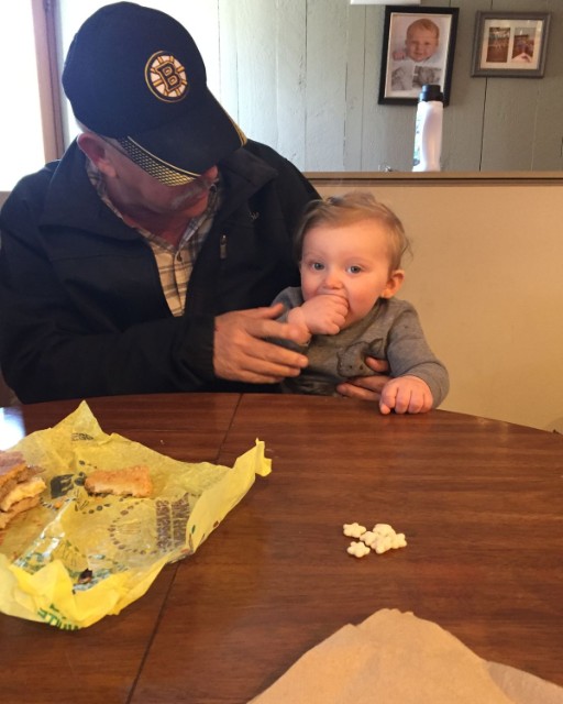 My Father-in-Law Sent Me This Photo of Him With My Son—But He Forgot About the Pictures Hanging on the Wall Behind Them.